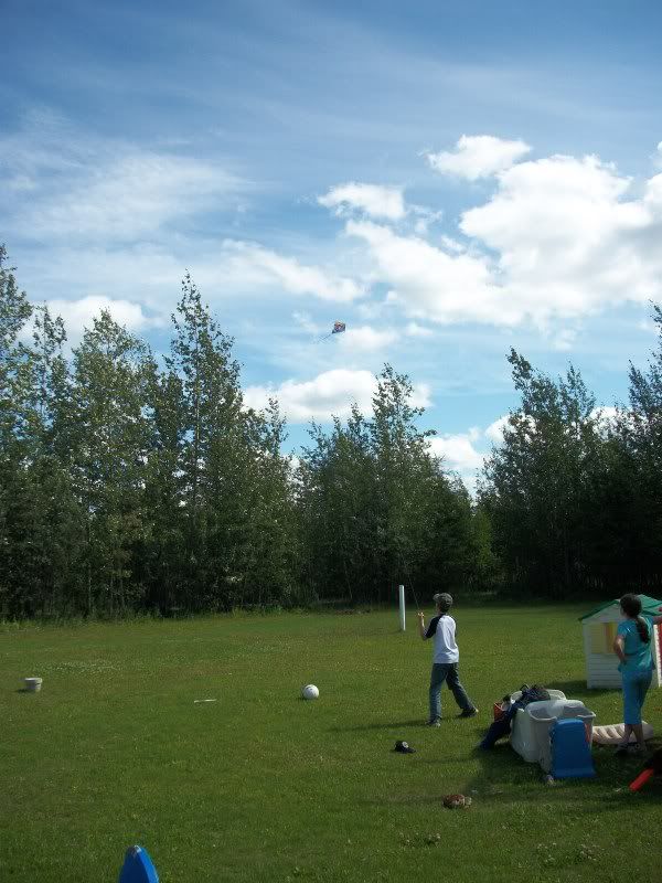 Levi flying a kite